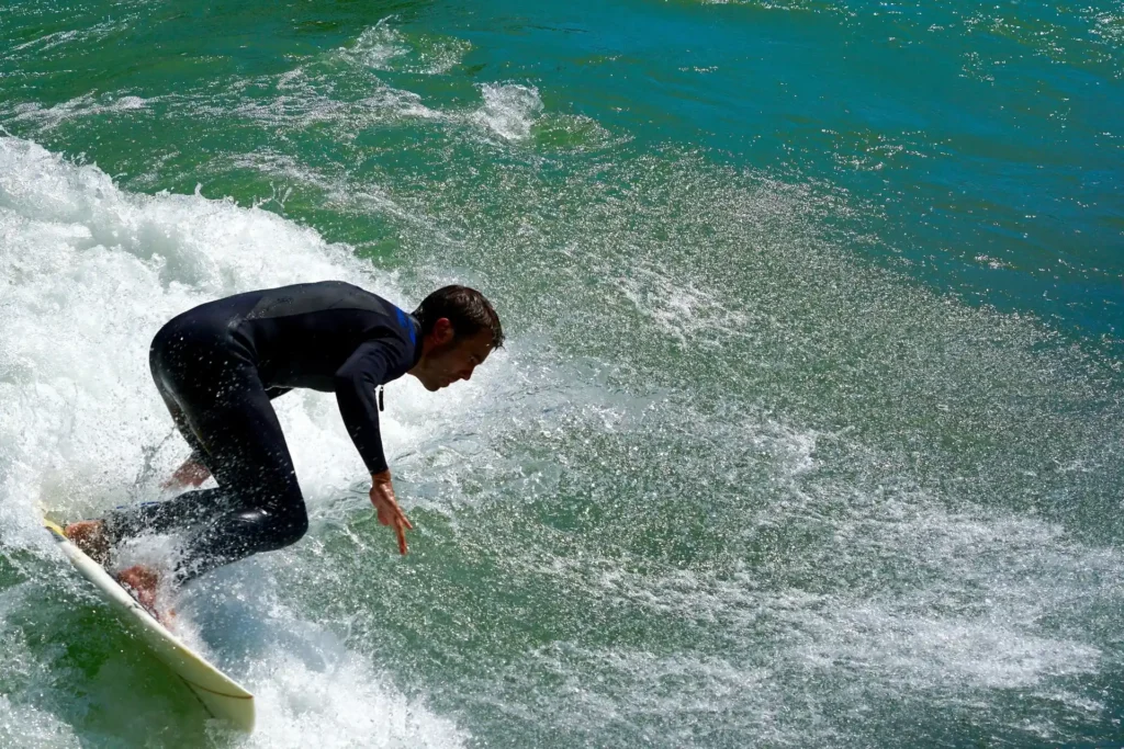 urfer riding a wave in Indonesia, representing Bali and Lombok surf culture