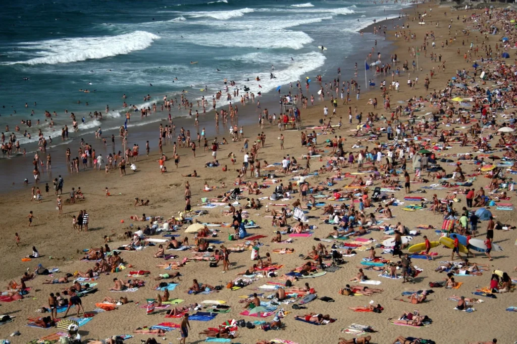 crowded-bali-tourist-beach-2026.webp	Crowded tourist beach in Bali showing heavy visitor traffic and busy shoreline activity during peak travel season.	Nyang Nyang Beach Bali Travel Guide (2026)
