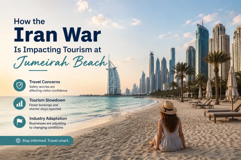 Woman sitting on Jumeirah Beach in Dubai during tourism slowdown concerns in 202