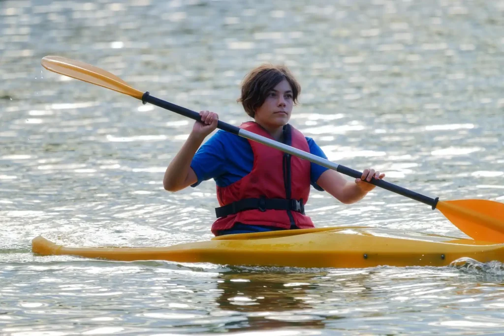 Kayaking adventure in Port Barton bay with calm tropical waters
