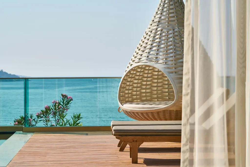 Overwater villas and clear tropical lagoon resort near Port Barton