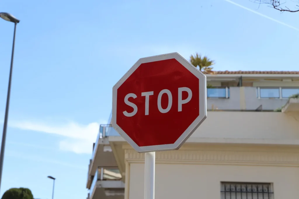 Stop sign representing strict visitor rules and protected marine park regulations.