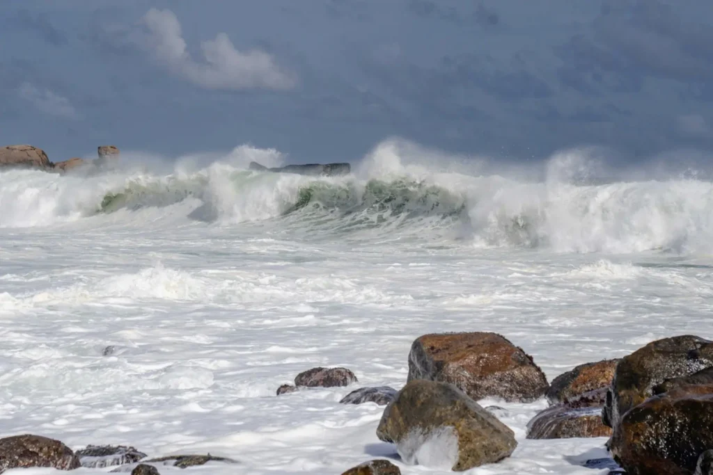 Powerful ocean waves during monsoon season near Hiriketiya Beach