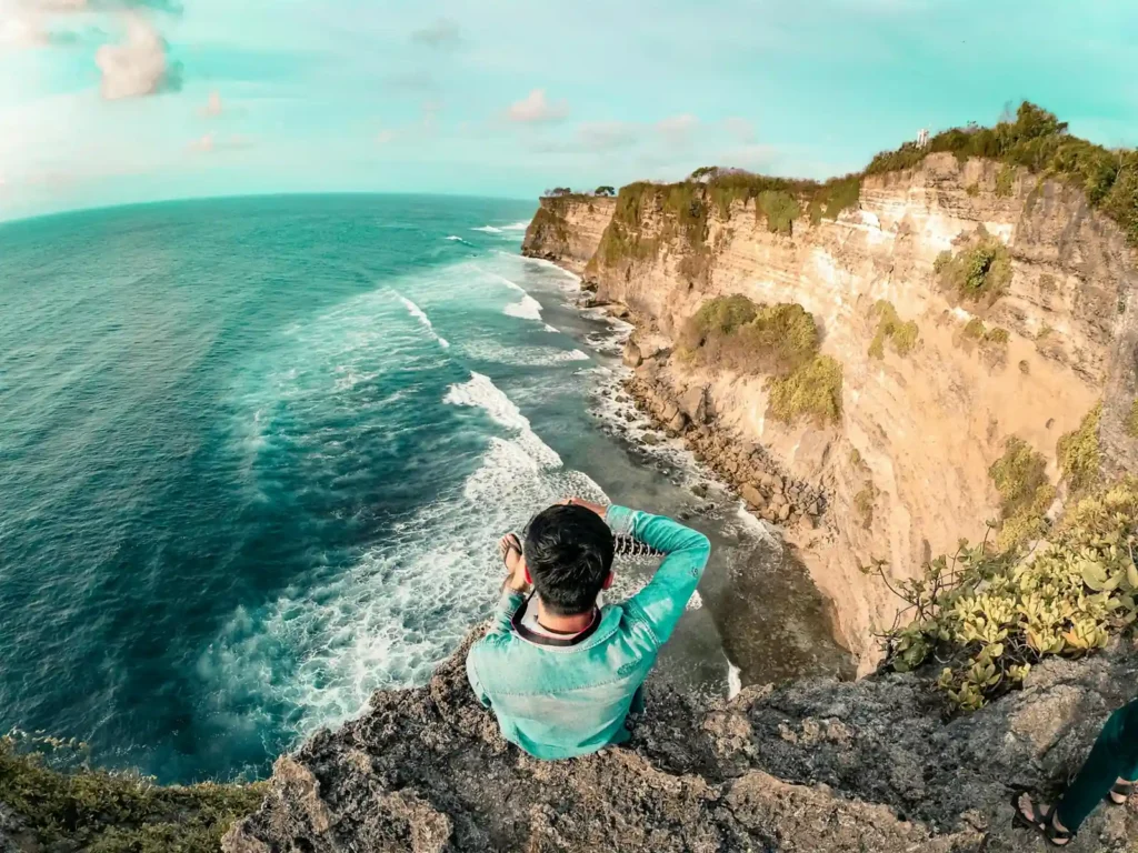 Wide panoramic view of Bali cliffs and ocean coastline near Uluwatu