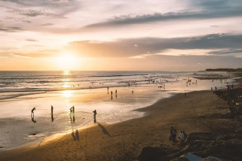 Golden-hour sunlight illuminating Nyang Nyang Beach cliffs