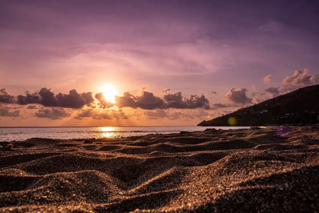 Soft sunrise light over Nyang Nyang Beach and limestone cliffs