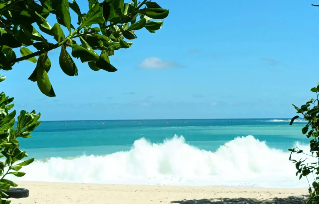 Calm swimming conditions at a safer Bali beach like Nusa Dua or Sanur