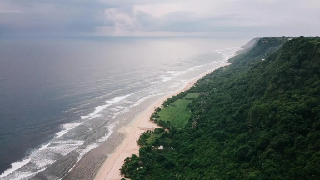 Nyang Nyang Beach in Uluwatu Bali with quiet white sand shoreline