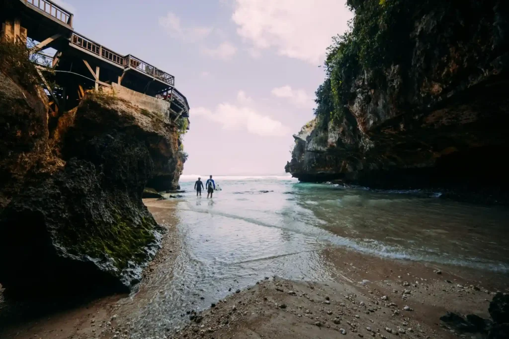 Suluban Beach cave entrance and surf cliffs in Uluwatu Bali