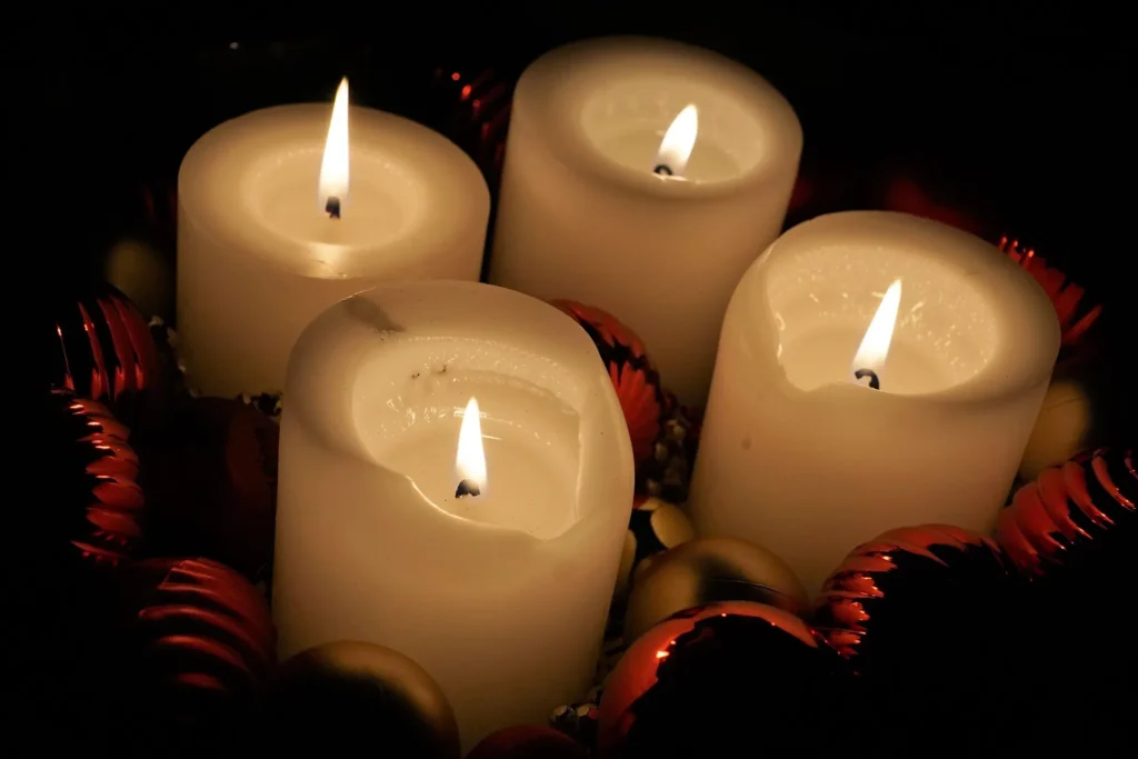Candles glowing beside a beach bonfire setup during Agonda nightlife.