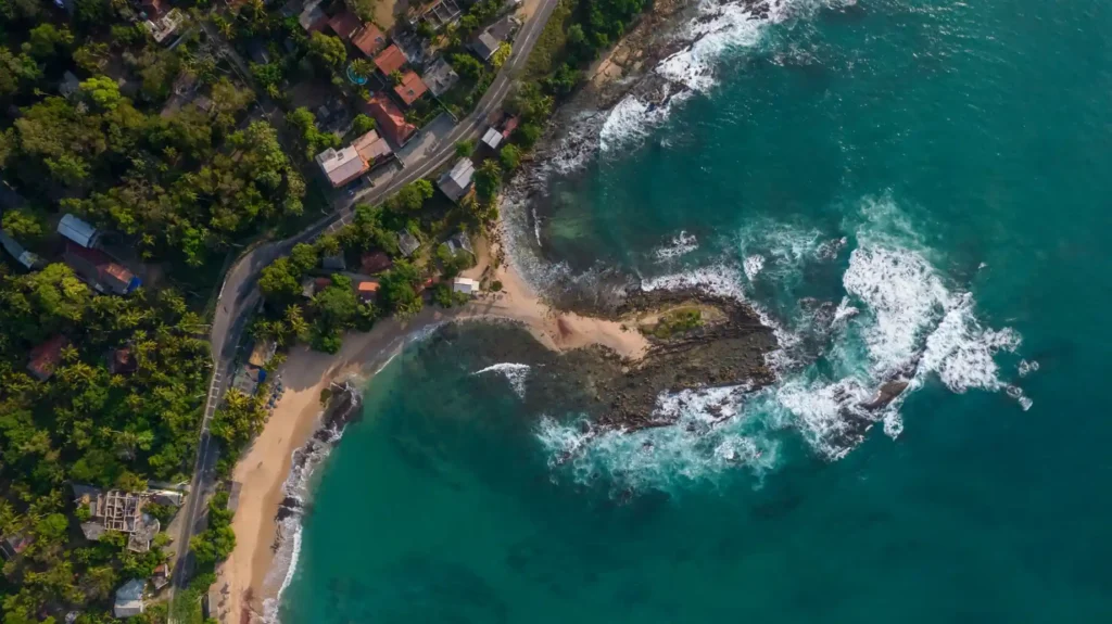 Aerial view of a tropical rocky coastline