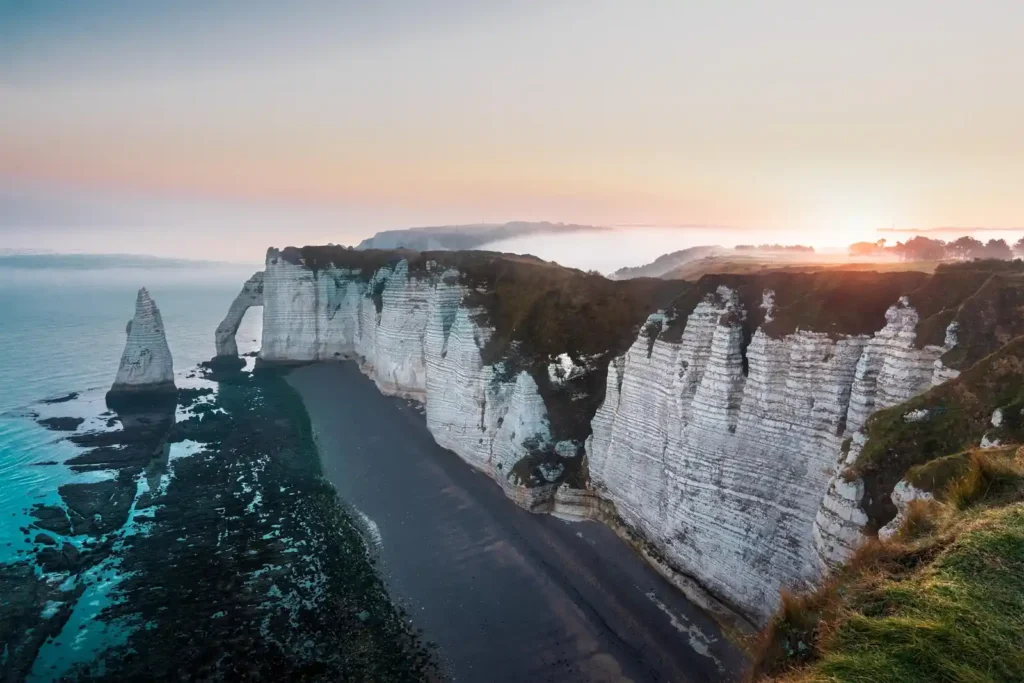 Towering limestone cliffs rising above Nyang Nyang Beach