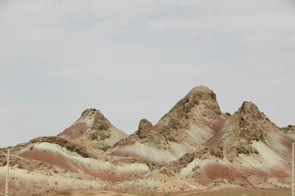 Colorful layered Martian Mountains near Chabahar, Iran, featuring surreal rocky formations along the Makran Coast.