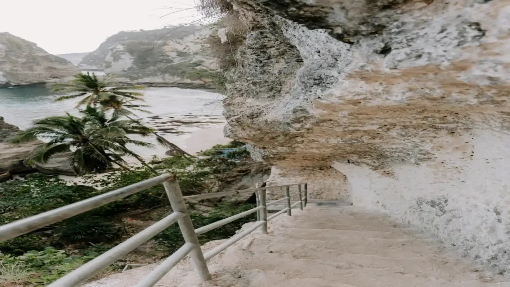Steep staircase trail descending toward Nyang Nyang Beach in Bali