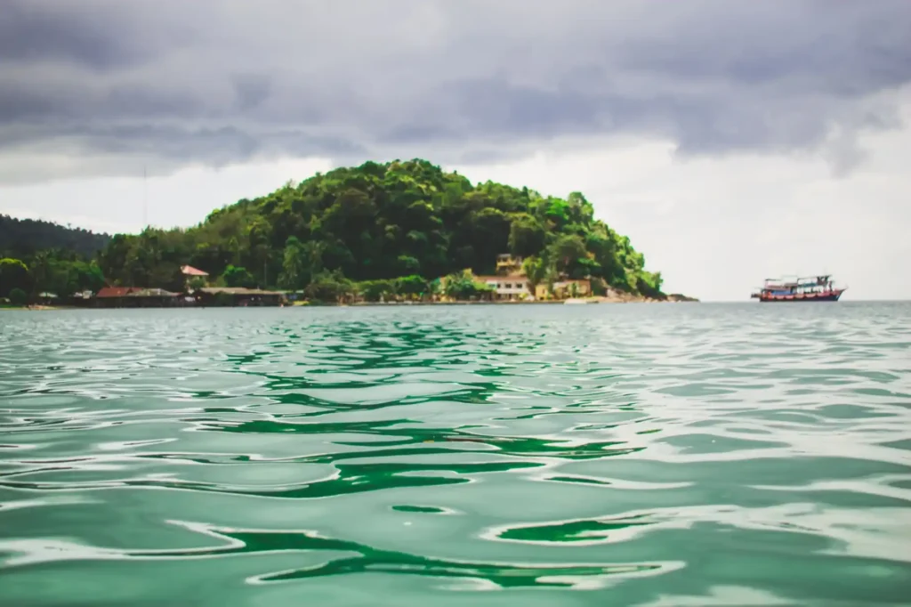Koh Chang island view with calm sea and cloudy sky.