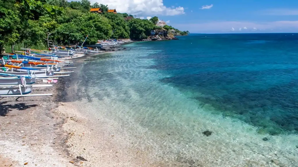 Amed Beach fishing boats and shoreline