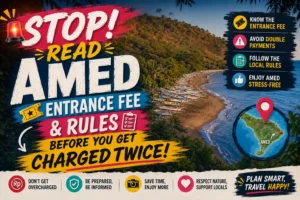 Amed Beach entrance fee warning poster with bold text highlighting ticket prices, local rules, and tips to avoid paying twice.