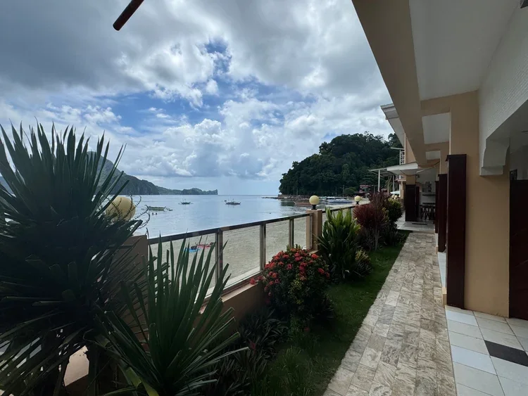 Oceanfront view from El Nido Beach Hotel overlooking the bay and nearby islands.