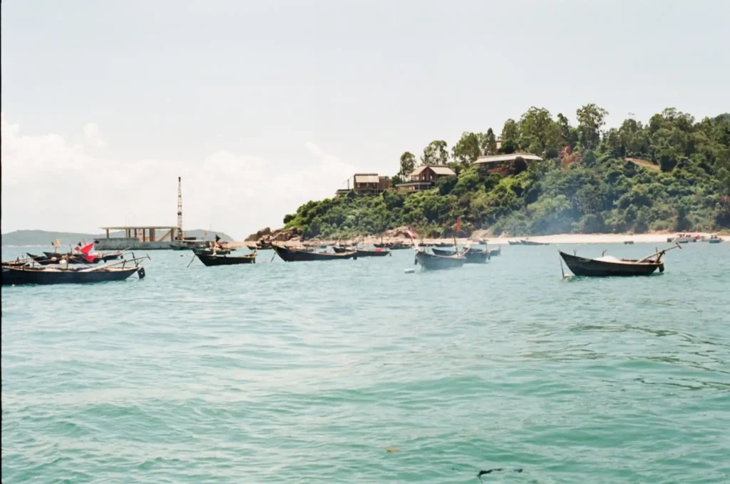 Longtail boats anchored off the coast of Koh Chang. 