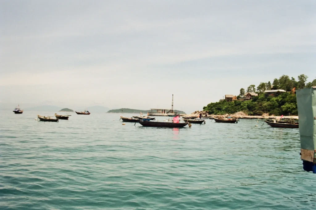 Longtail boats anchored off the Koh Chang coastline. 