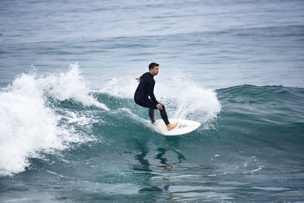 Surfer riding an ocean wave